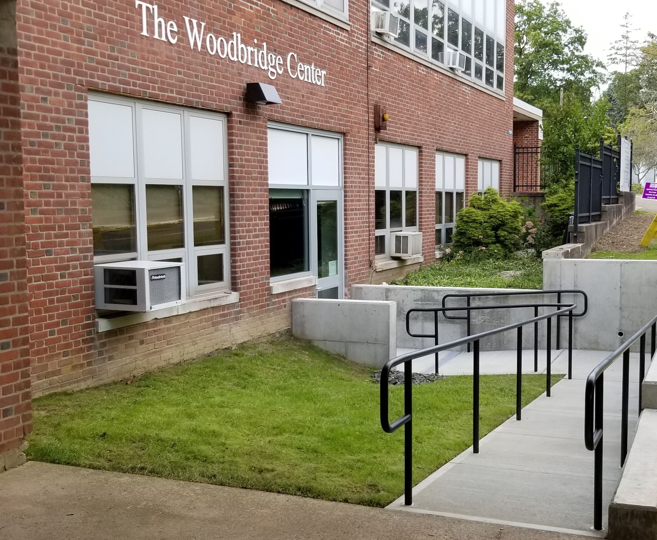 ADA compliant ramp with new Center sign