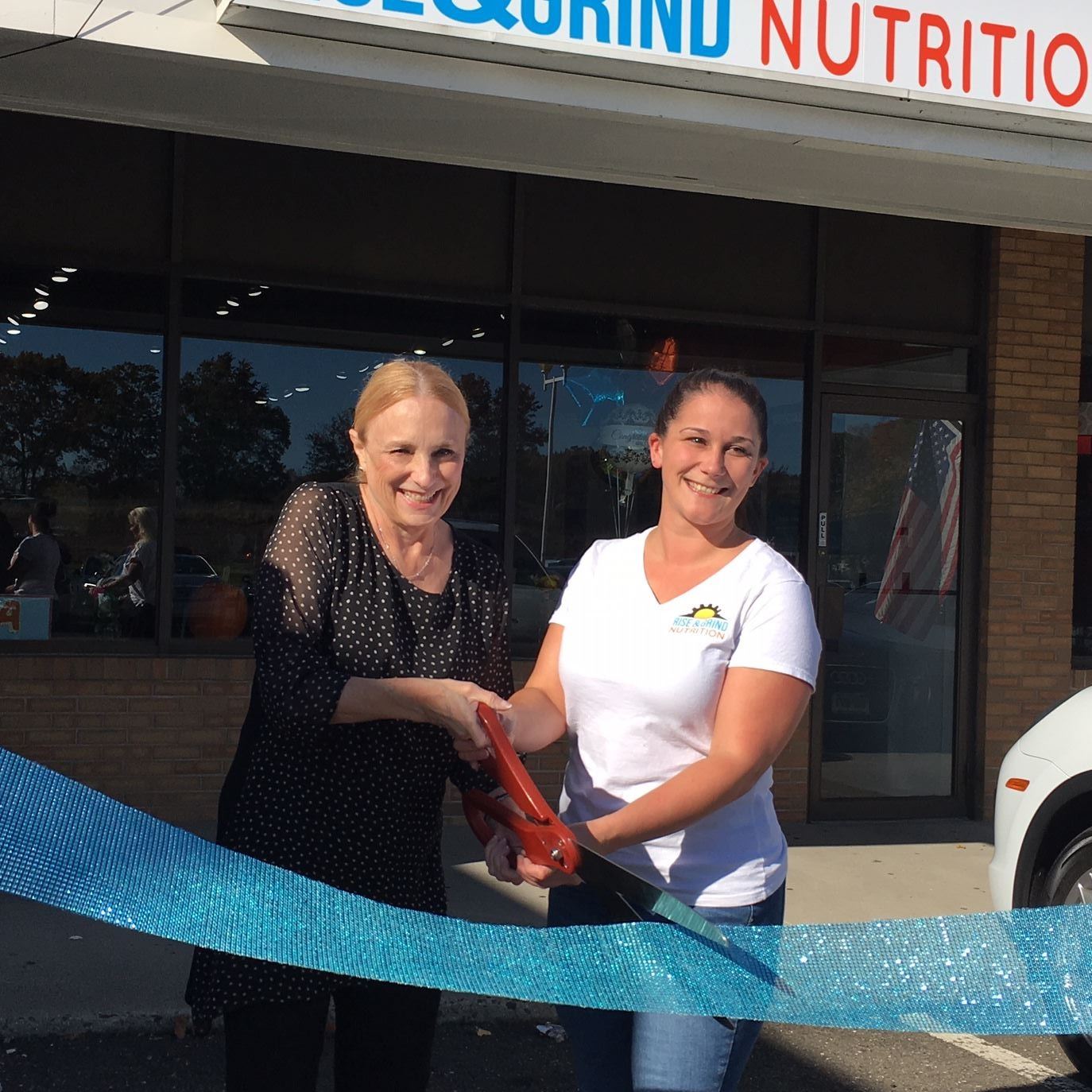 Rise and Grind ribbon cutting